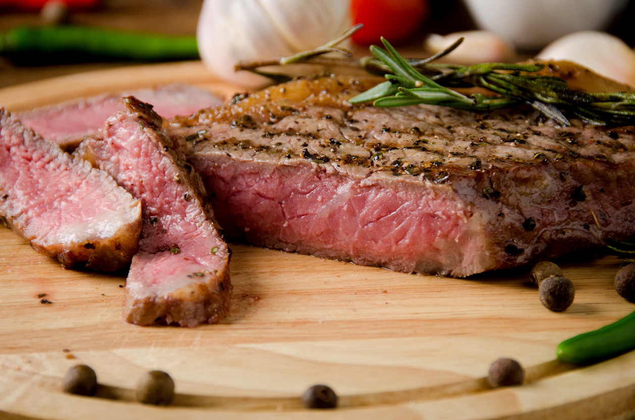 Prime rib plated at a premium table